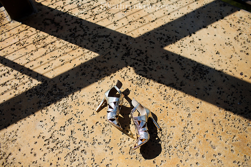 Bride's shoes with shadows.