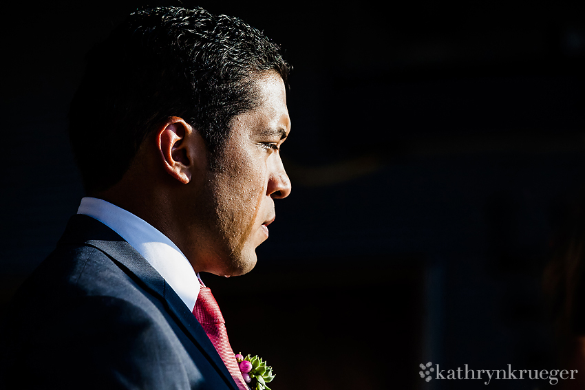 Groom with tear streaming down check.