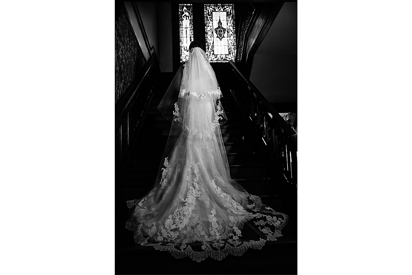 Lace Cathedral Veil on a bride on a staircase