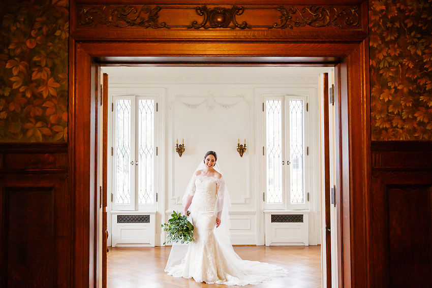 Smiling bride in a Parisian style room