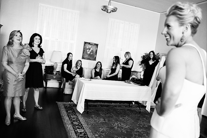 Black and white image of bride with her friends.