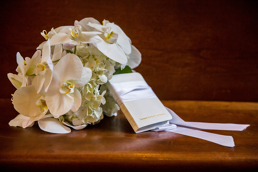 Bridal bouquet detail with bible.