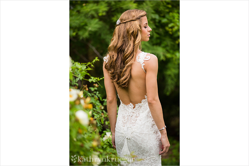 Bridal portrait showing off brides hair and back.