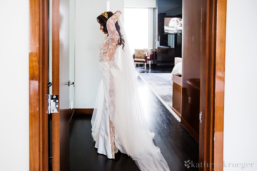 Bride puts on veil