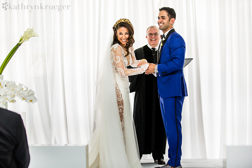 Laughing Bride and Groom in ceremony