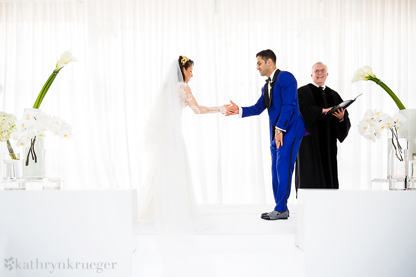 Bride and Groom give special handshake