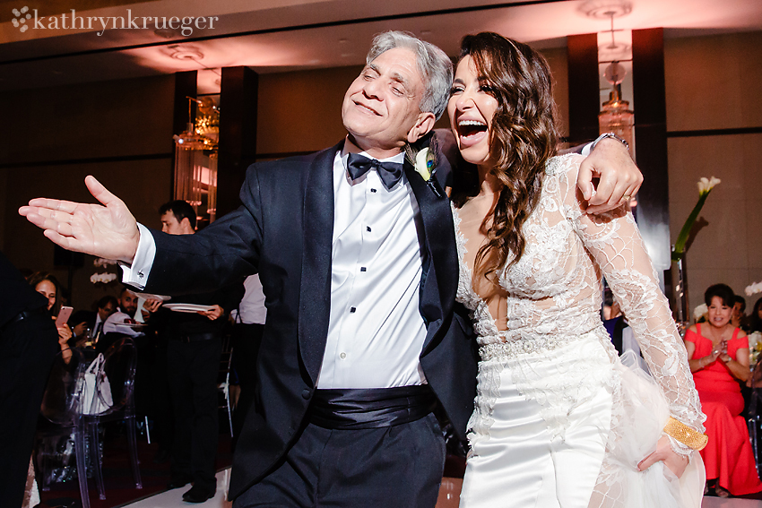 bride dances with father in law