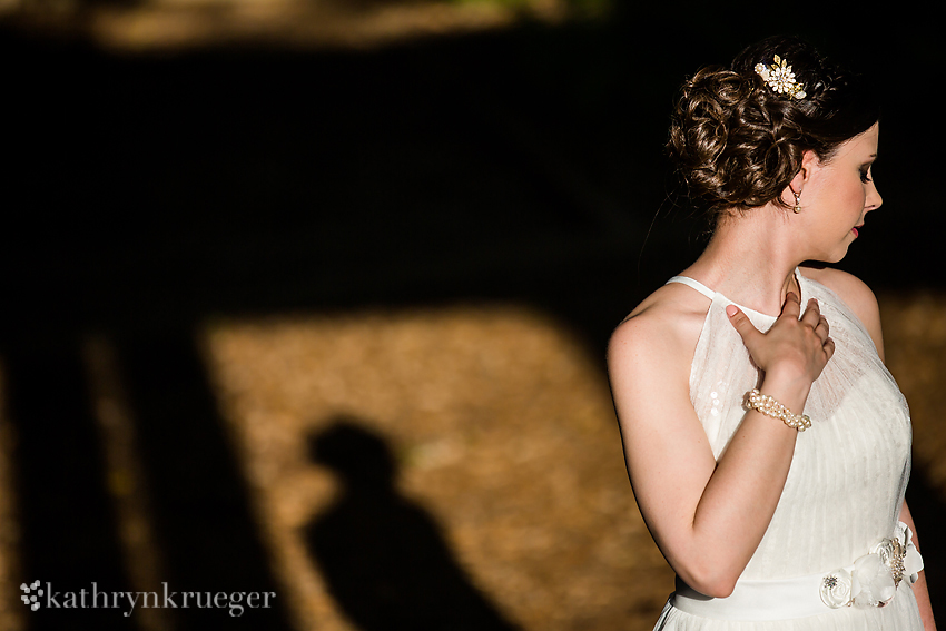 Bridal portrait with brides shadow in background.